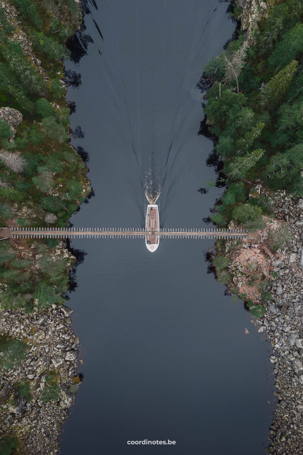 A boat crossing the Suspension Bridge at Julma-Ölkky in Finnish Lapland