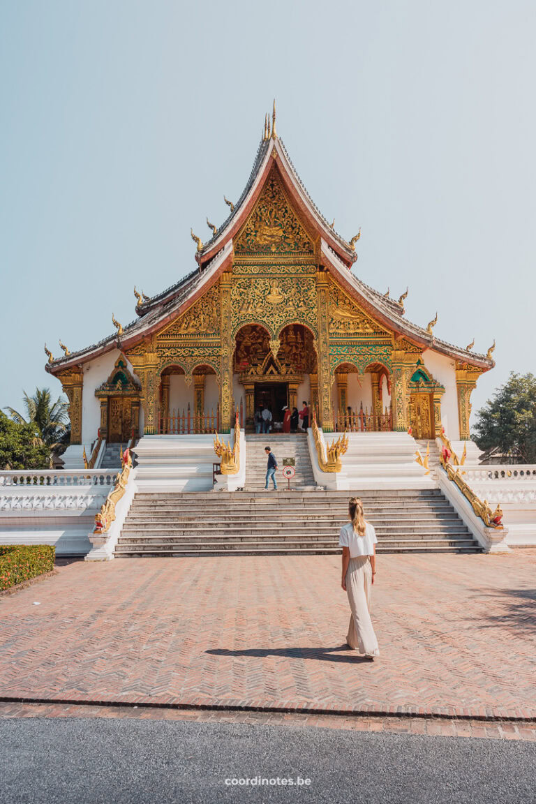 Sarah walking in front of the Haw Pha Bang Temple on the site of the Royal Palace in Luang Prabang